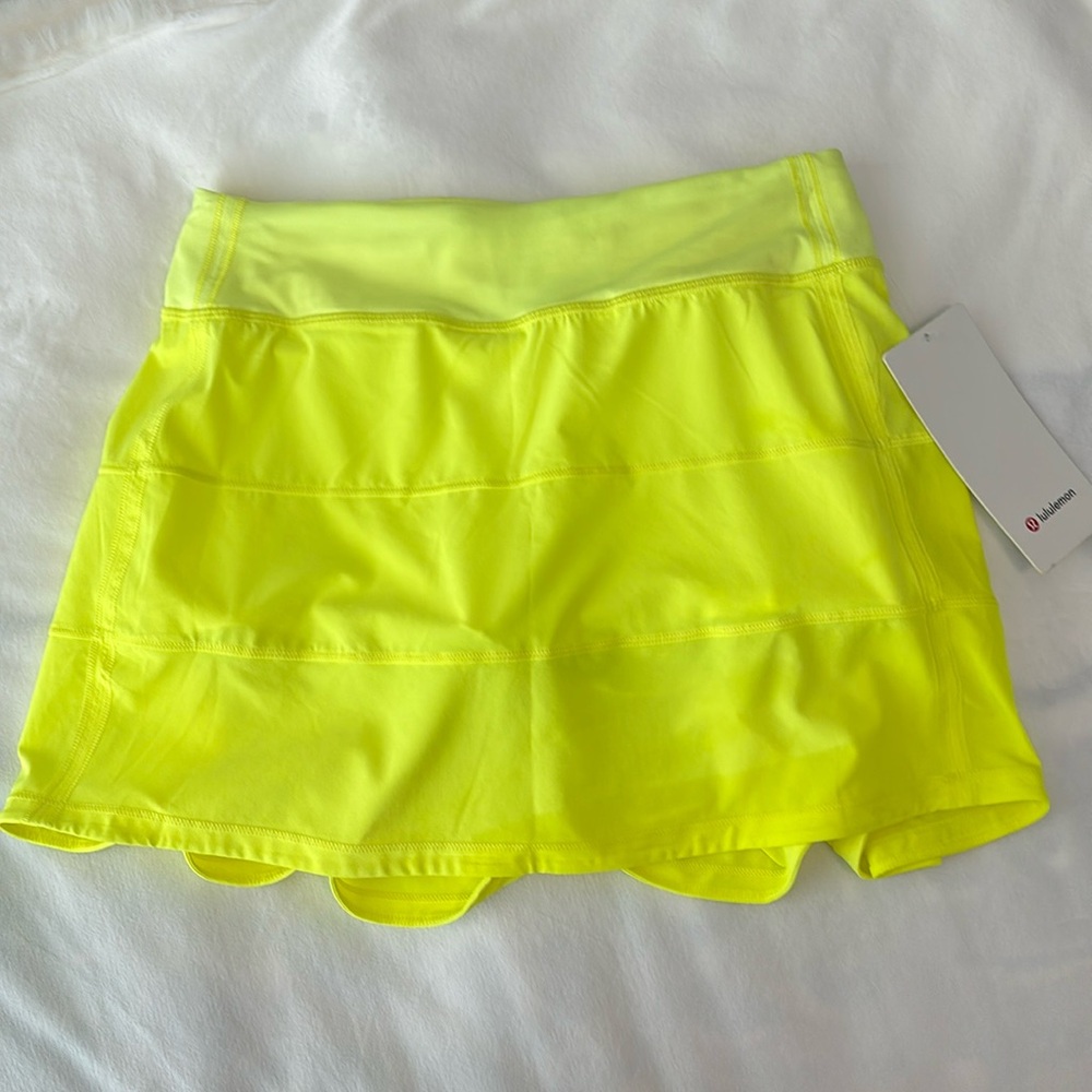 NWT Lululemon neon yellow, Pace Rival MR Skirt *long. Built in biker shorts.